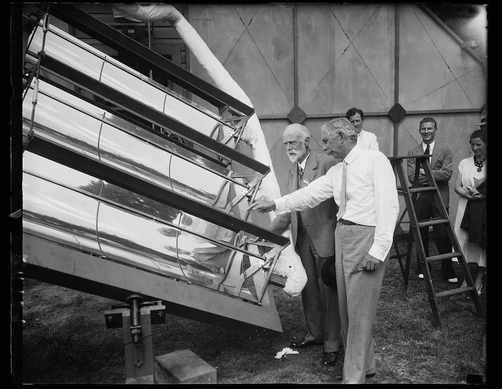  Dr. Charles G. Abbot demonstrating a solar energy device.  Image courtesy of the Smithsonian Institution Archives.  